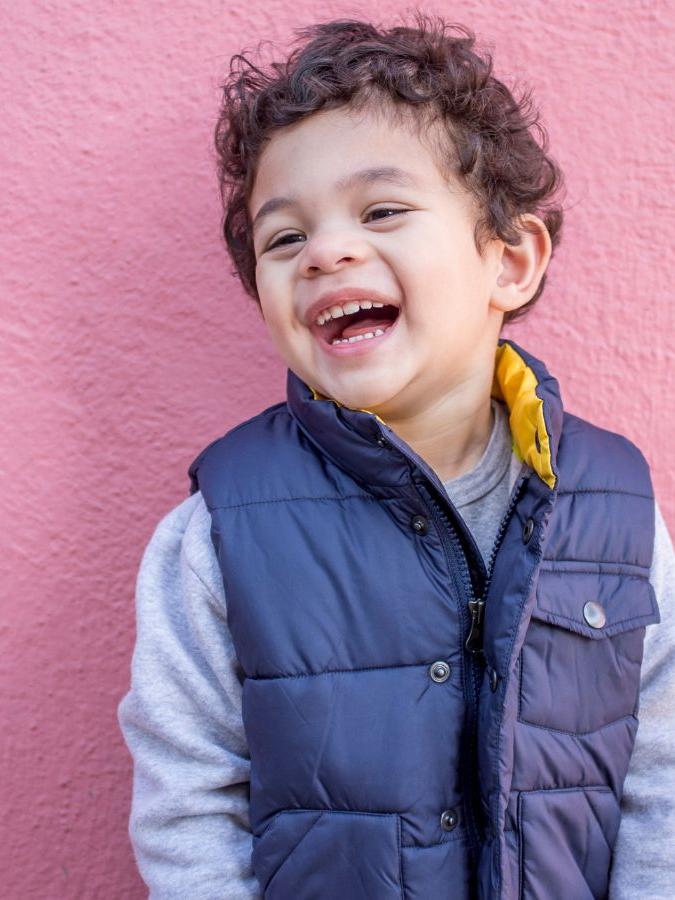 Young boy with smiles (Latino or bi-racial)